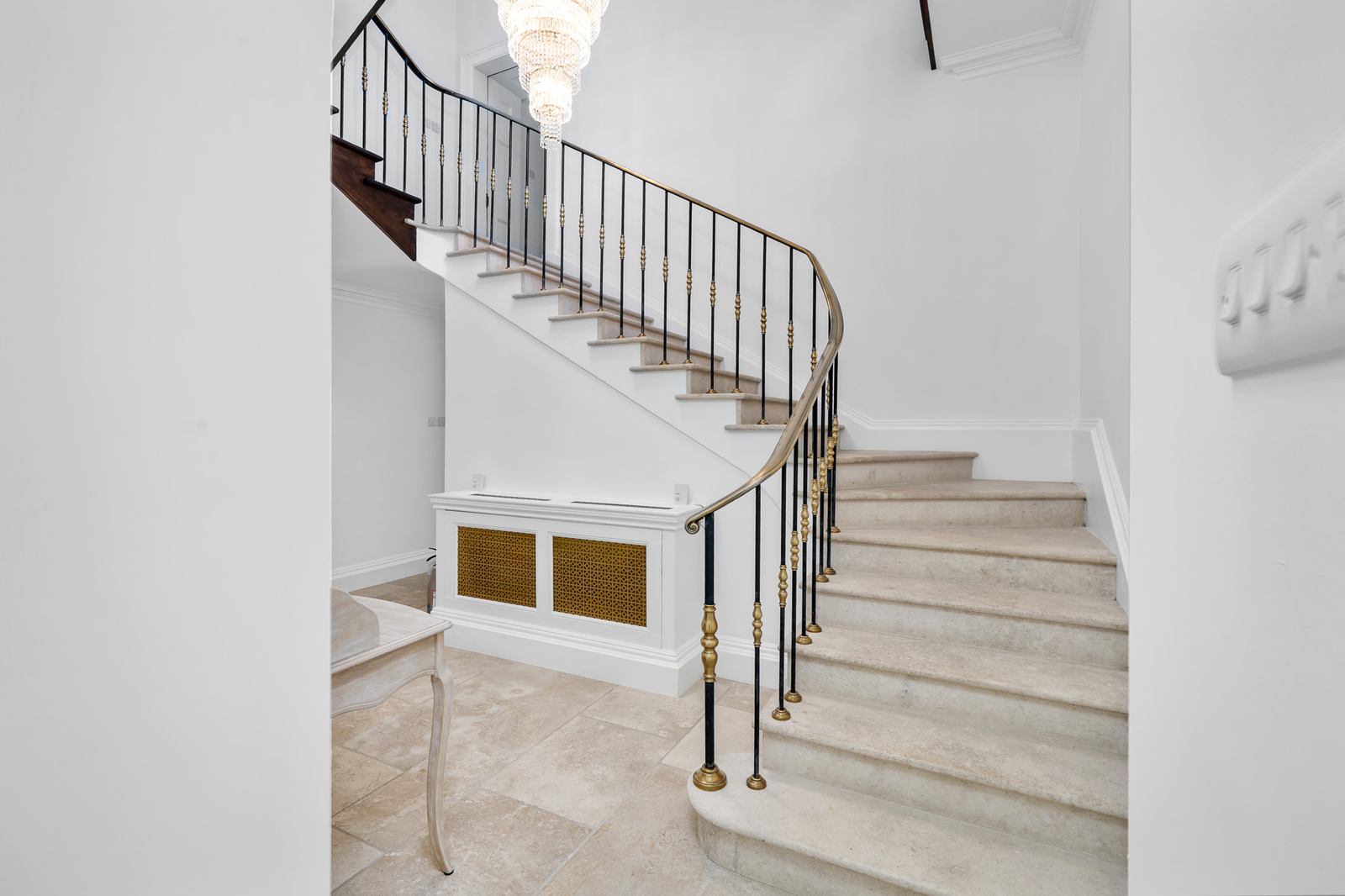 Sweeping spiral staircase in a period country manor